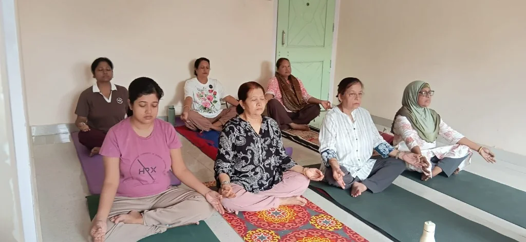 Yoga students participating in a group session at NOHADAYA